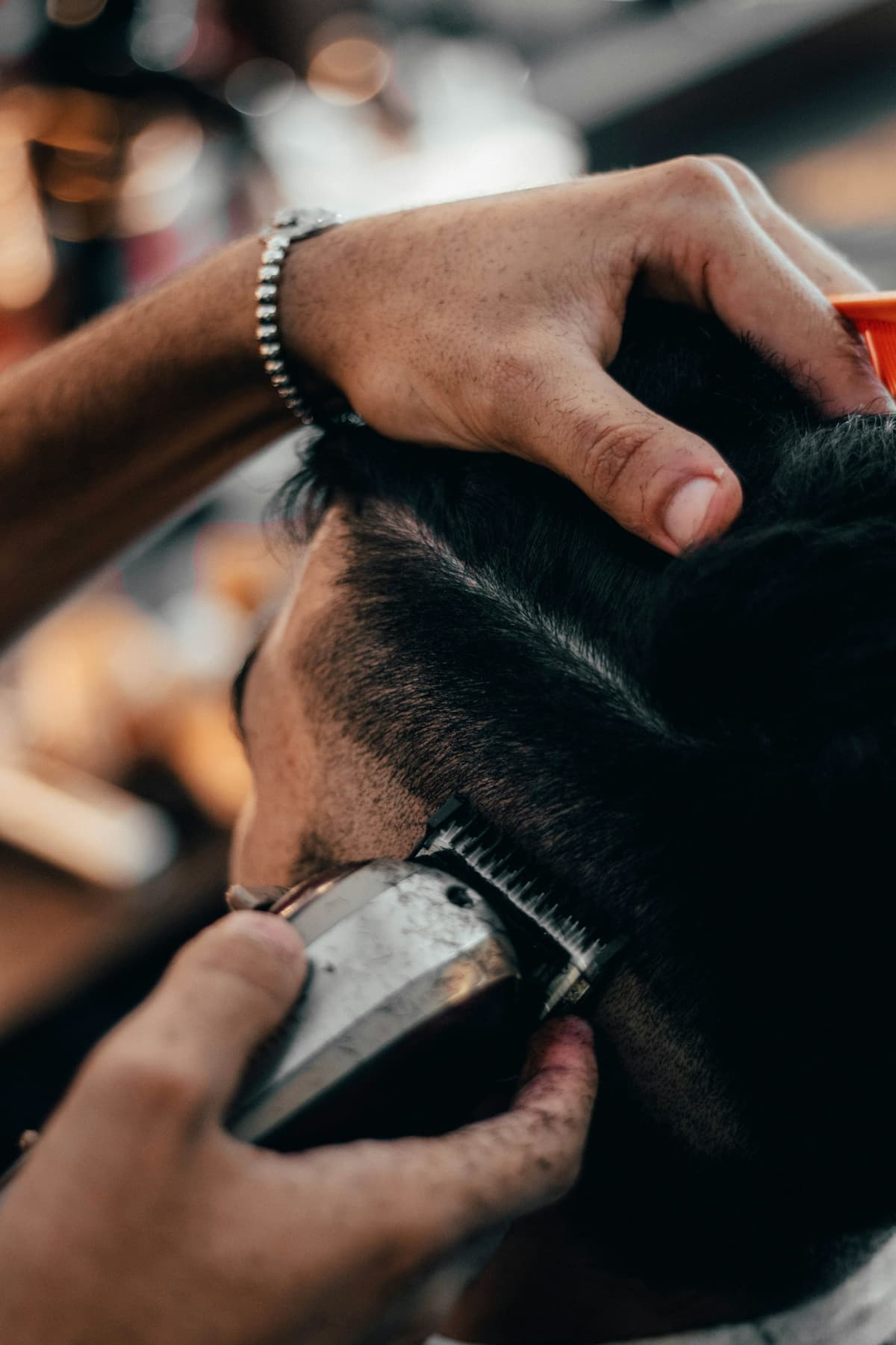 Clipper blade carving a clean neckline taper